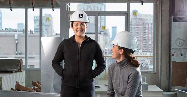 Bridgit co-founders Lauren Lake and Mallorie Brodie wearing construction hats