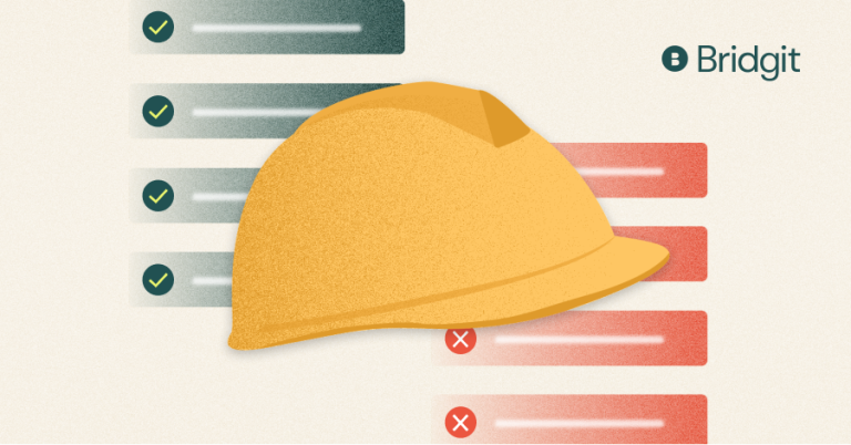 Construction hat with checklists in the background